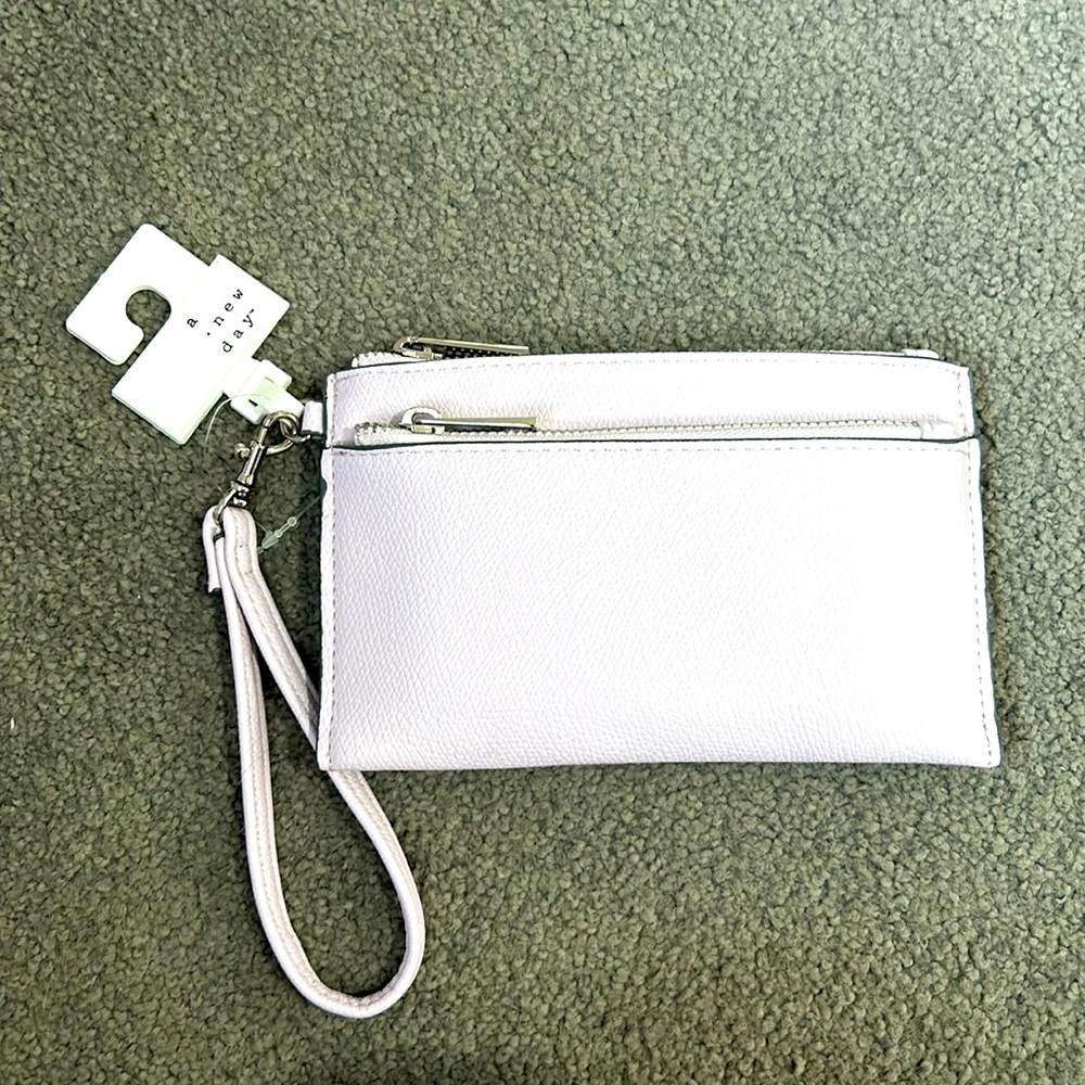lavender wrist purse with 2 pockets and card holders inside